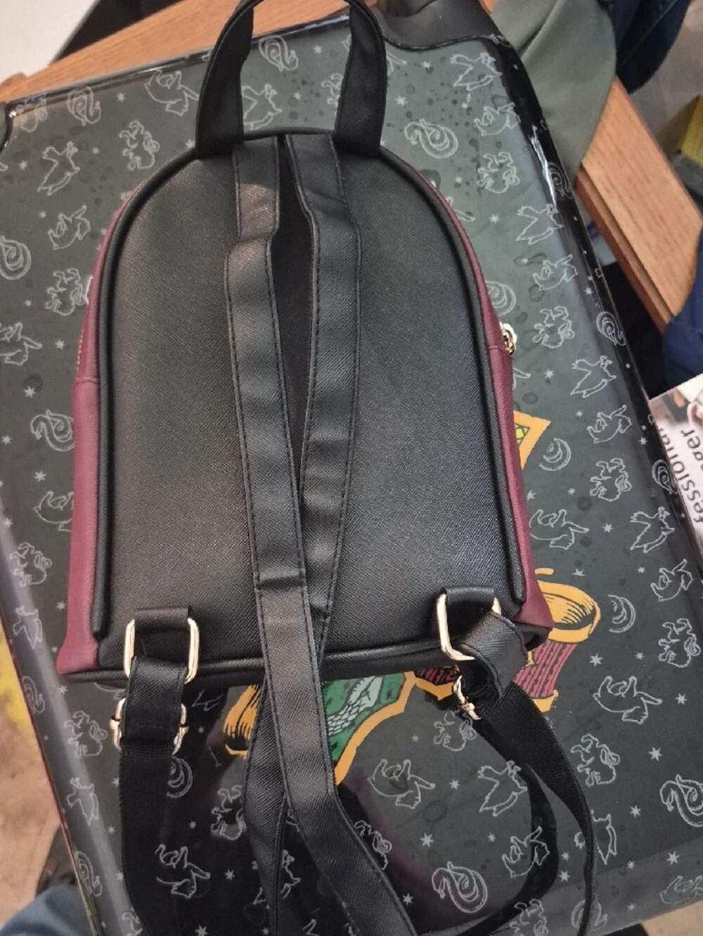 Warner Bros. Maroon Mini Backpack with Gold Crest